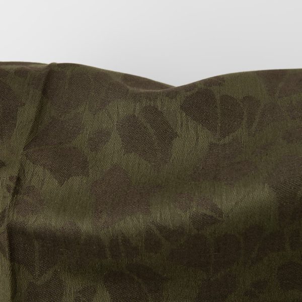 Green linen blend jacquard fabric close up detail