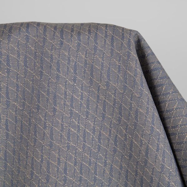 Linen cotton fabric blueish brown patterned close up detail