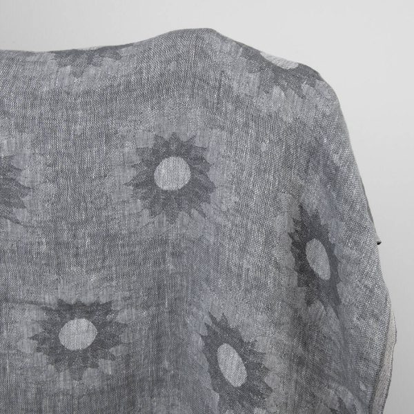 Grey linen fabric with floral pattern washed