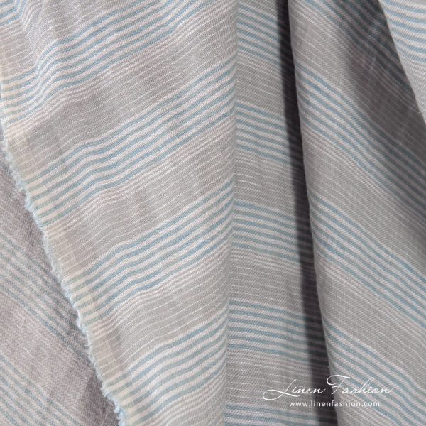 Grey blue linen fabric in stripes, specially washed to increase softness