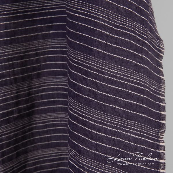 Dark blue linen fabric in stripes, specially washed to increase softness