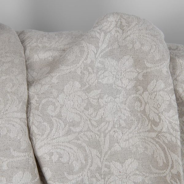 Undyed linen and white cotton fabric with flowers texture
