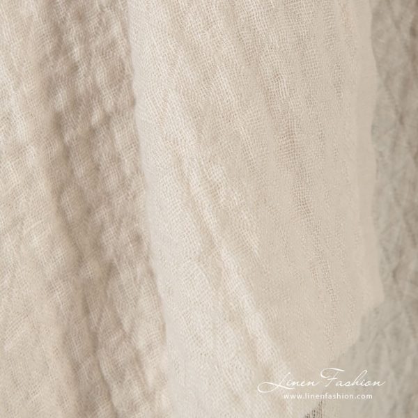 Light cream linen fabric in rhombus, specially washed to increase softness