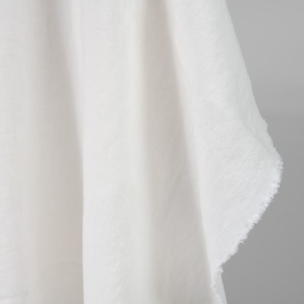 Washed heavy linen fabric off-white colour edge view