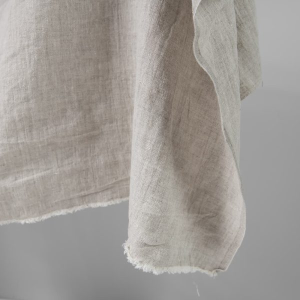 Washed heavy linen fabric beige colour edge view