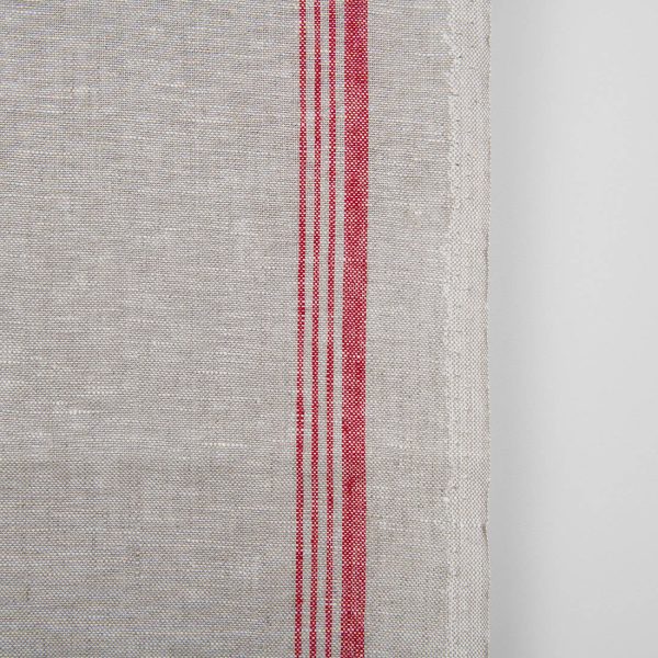 Narrow linen towel fabric in beige, with red stripes on one edge