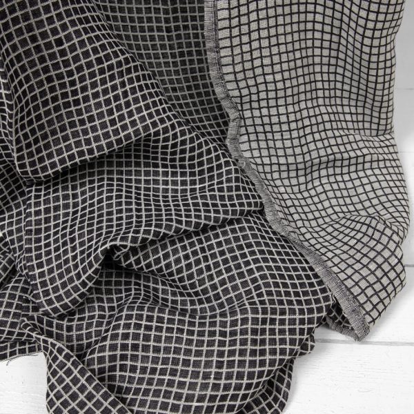 Half-linen fabric in black and white checks washed texture