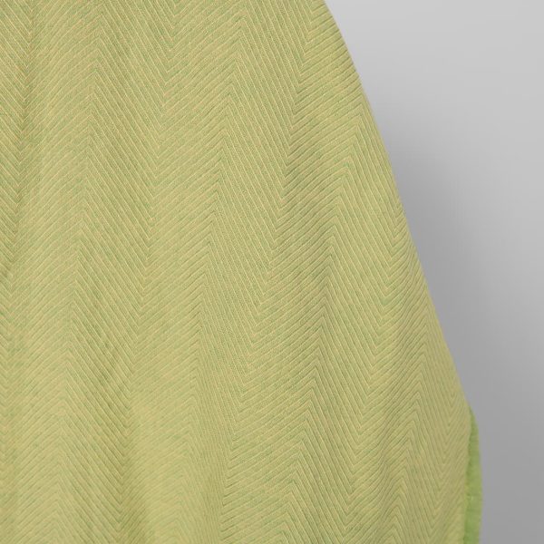 Washed linen cotton fabric yellow green herringbone, fabric edge