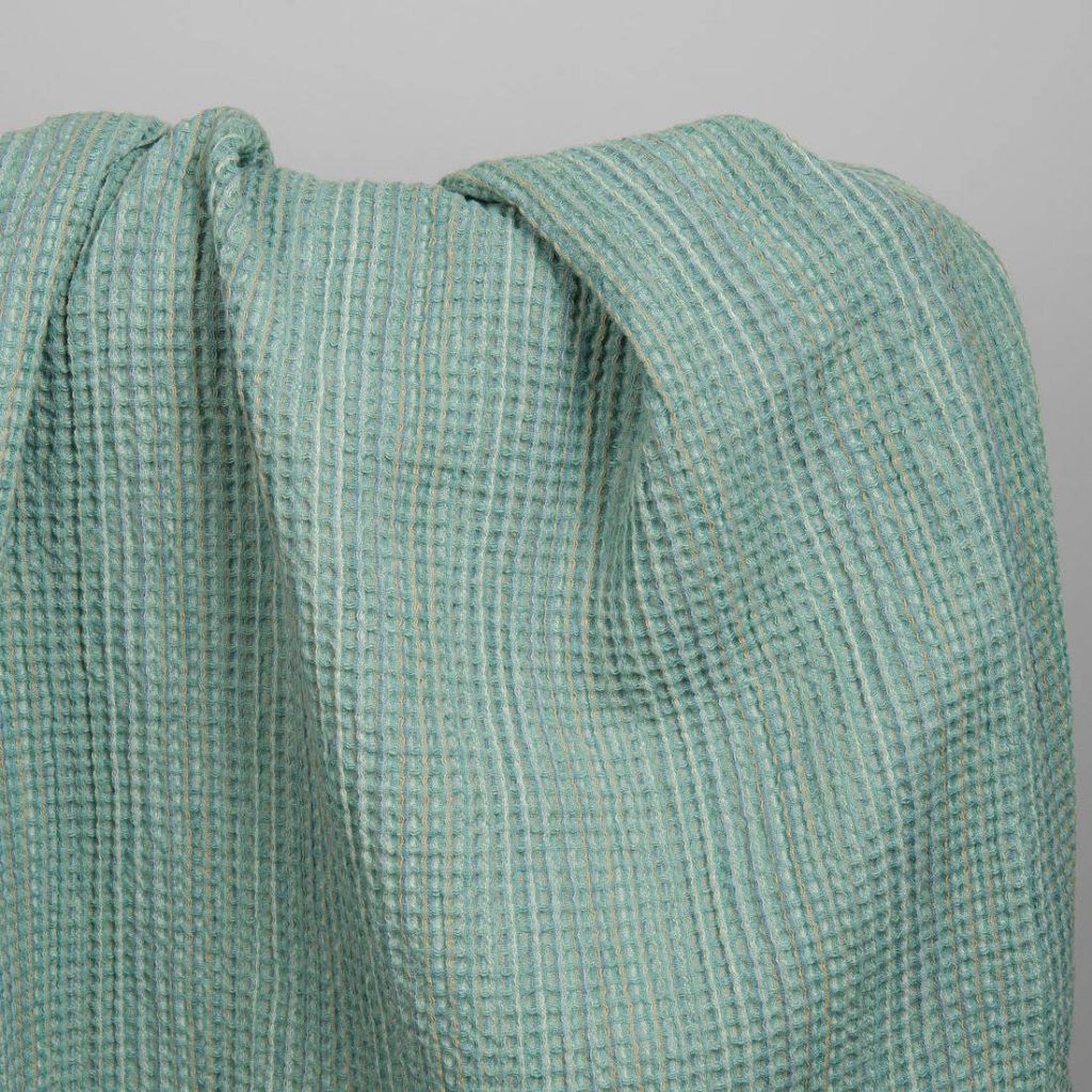 Washed green linen cotton waffle weave fabric