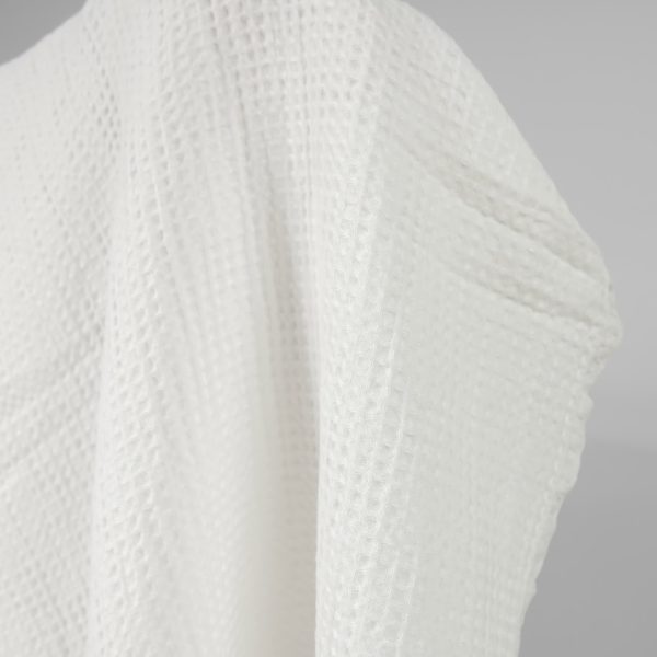 Washed linen cotton fabric off-white waffle close up detail