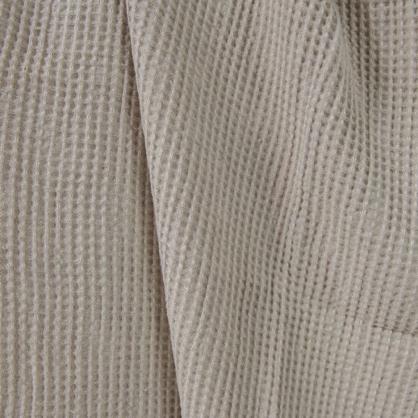 Washed linen cotton fabric beige waffle close up detail