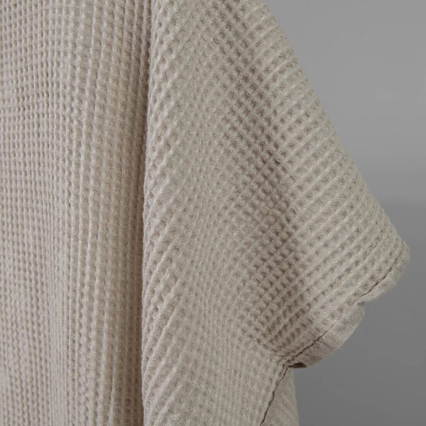 Washed linen cotton fabric beige waffle edge view