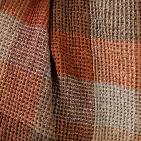 Washed linen cotton fabric brown colour checks waffle close up detail