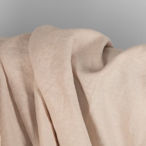 Washed linen cotton fabric light brown colour close up view