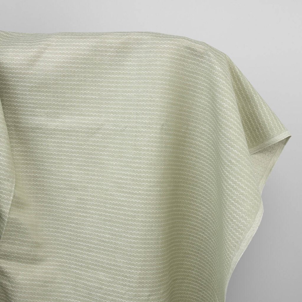 Light green linen cotton fabric in a zigzag pattern