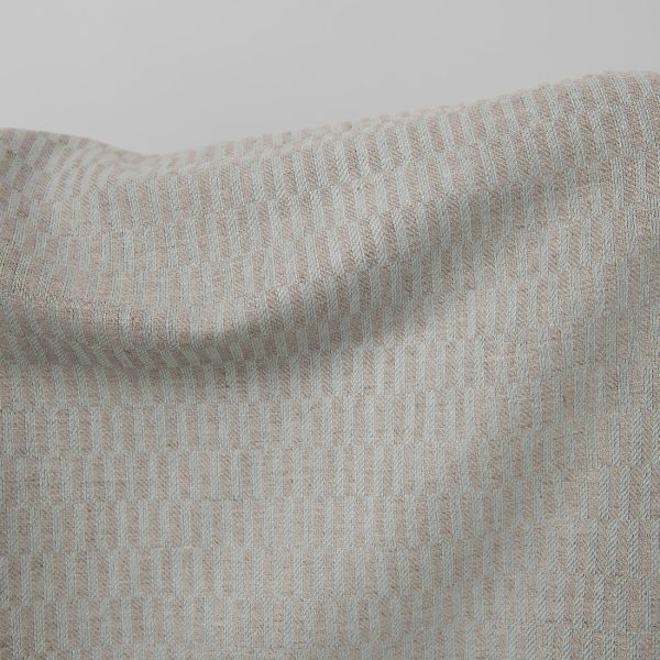 Blue and grey patterned linen cotton fabric close up detail