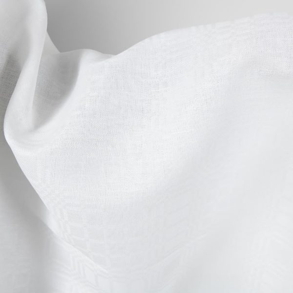 Linen cotton fabric bright white checks pattern close up view