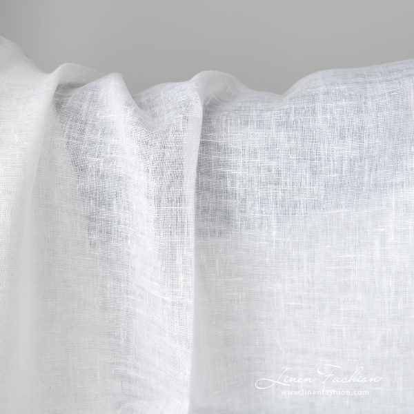 Lightweight linen fabric bright white colour close up detail