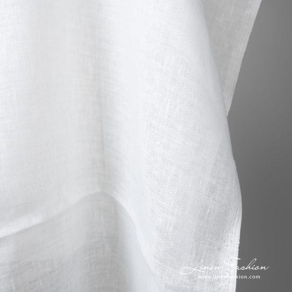 Lightweight linen fabric bright white colour edge view