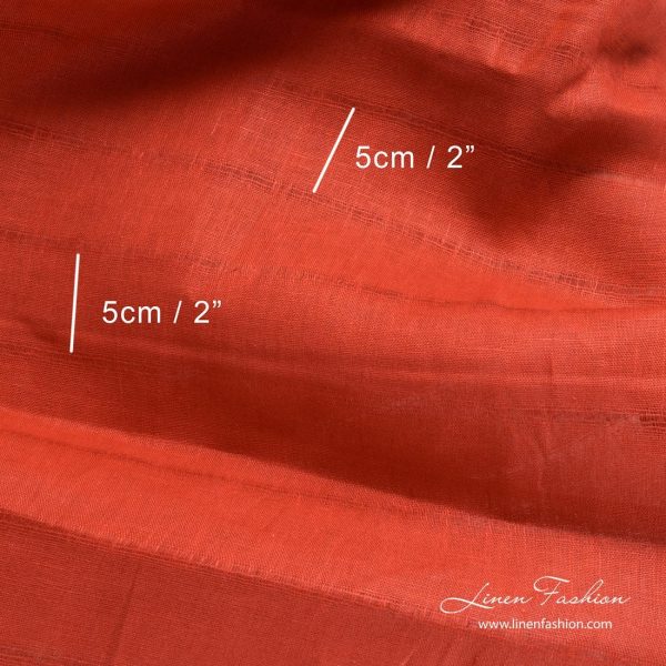 Lightweight red linen fabric with horizontal azure stripes