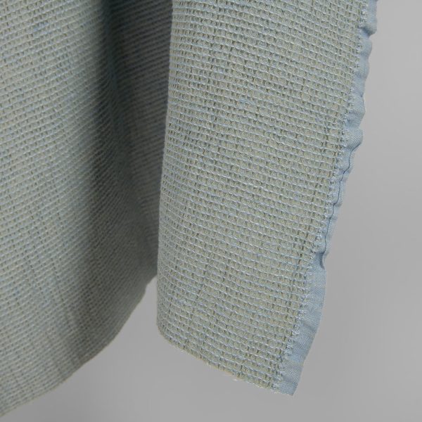 Washed linen cotton fabric blueish green waffle edge view