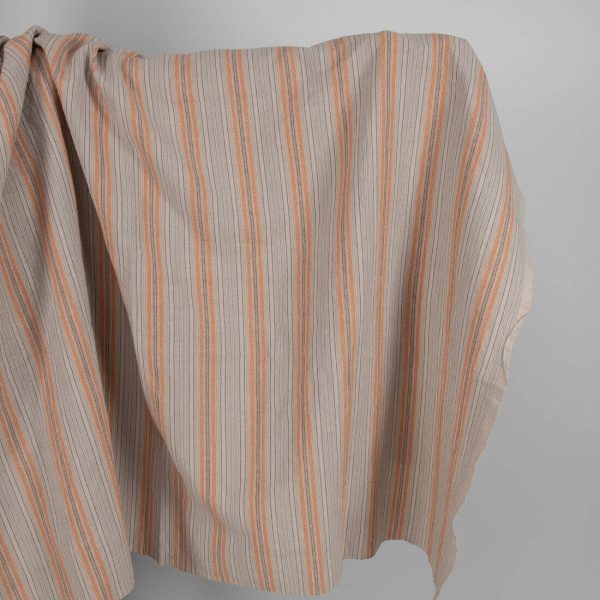 Washed linen cotton in brown patterned stripes