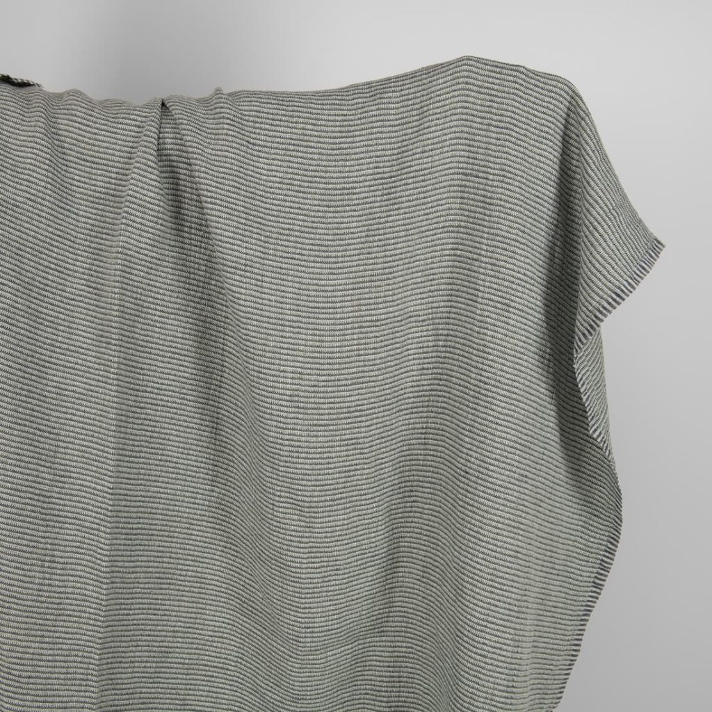 Washed linen fabric green-grey small pattern