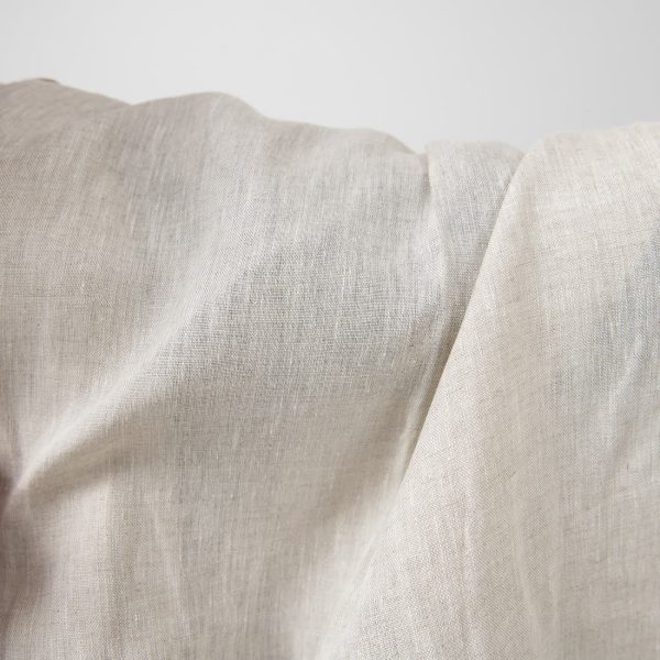 Pure linen fabric in light grey close up detail
