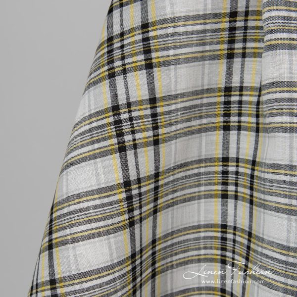 Black yellow checked linen fabric.