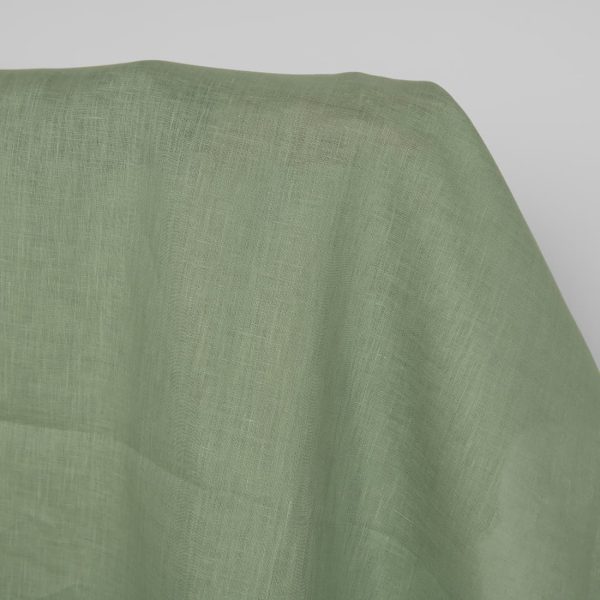 Linen fabric in muted light green, 100% linen