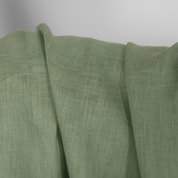 Linen fabric in muted light green, plain weave