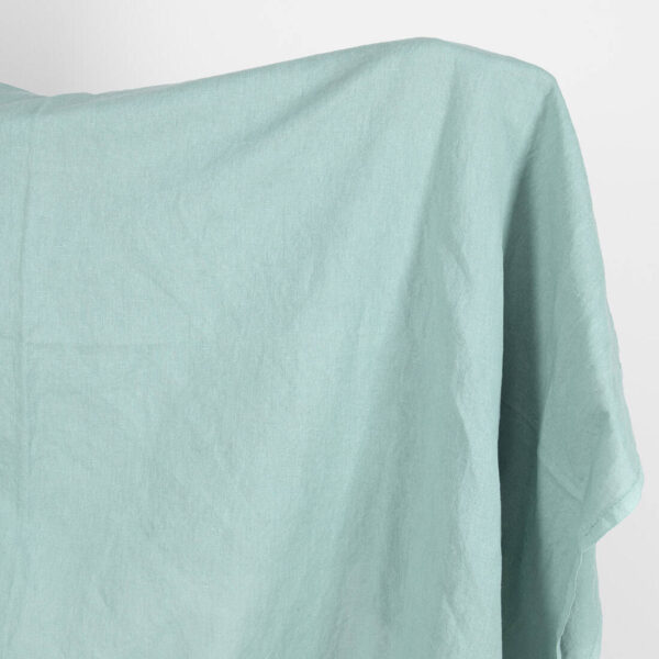 Linen cotton fabric in jadeite colour, washed