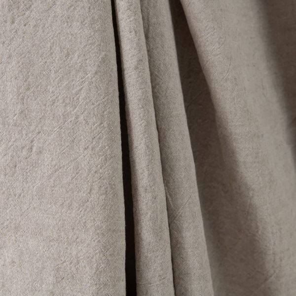 Wide washed linen cotton fabric sand colour close up detail
