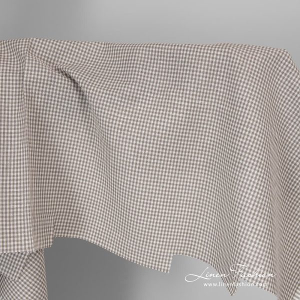 Linen cotton fabric in fine grey white checks.