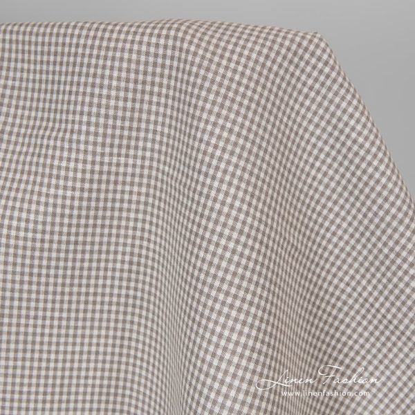Linen cotton fabric in grey white checks.