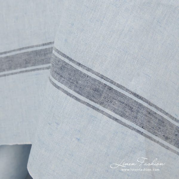 Light blue fabric in stripes.