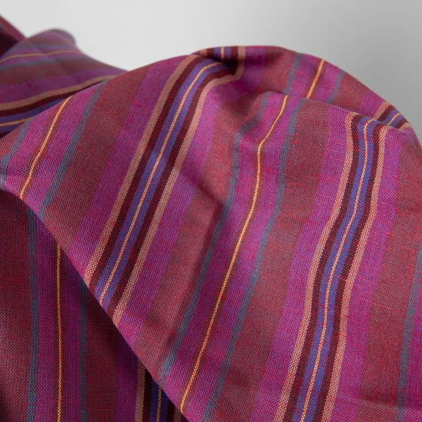 Linen cotton fabric in different shade red stripes close up detail