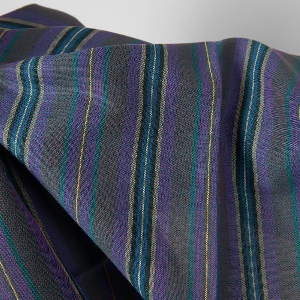 Linen cotton fabric in violet and blue stripes close up detail