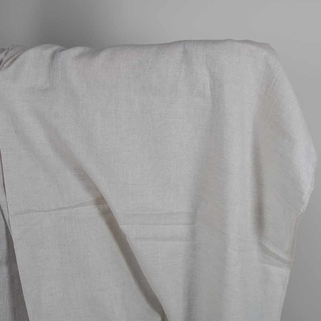 Patterned fabric undyed linen and white mix