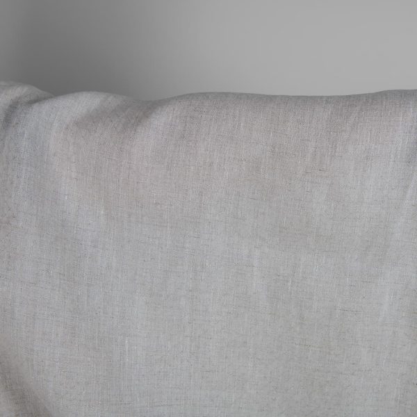 Patterned fabric undyed linen and white mix close up detail