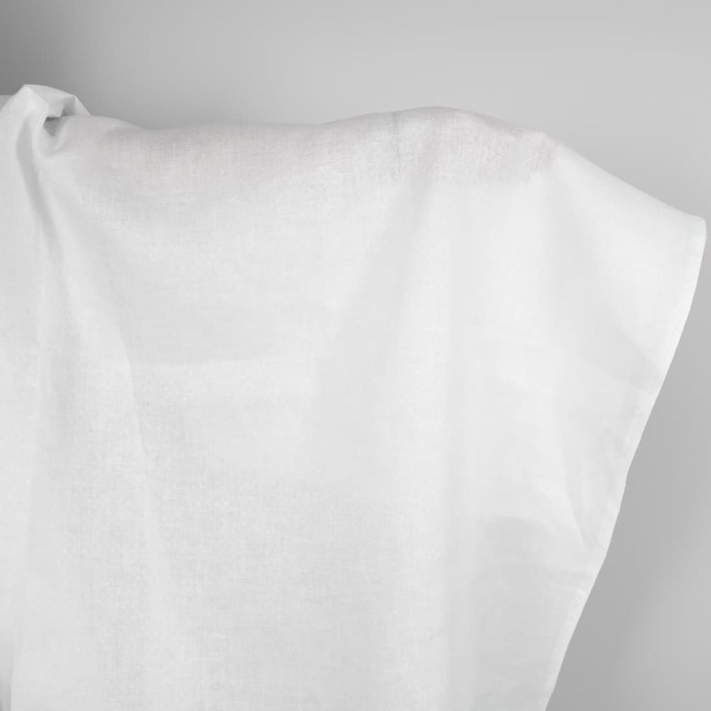 Patterned optical white linen fabric
