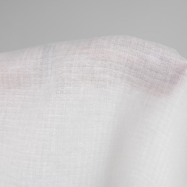 Linen fabric off-white colour patterned checks close up detail