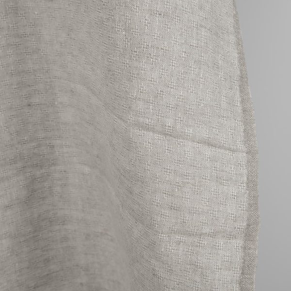 Openwork patterned linen fabric in beige edge