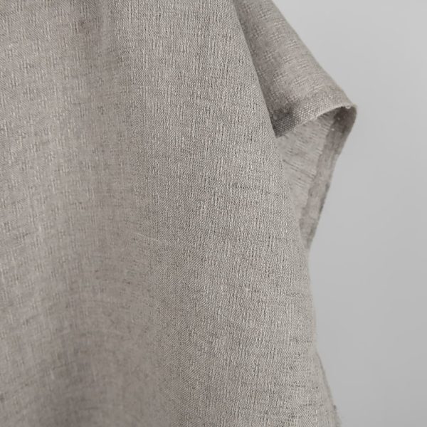 Natural linen fabric in an openwork pattern edge