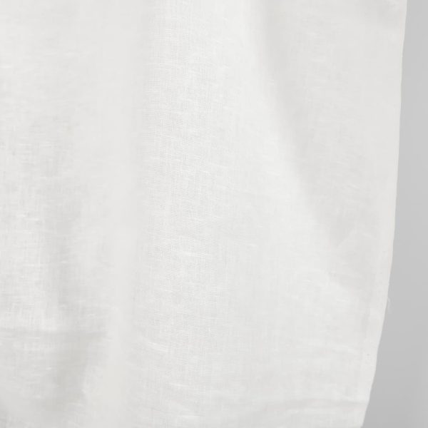 Pure linen fabric in off-white edge