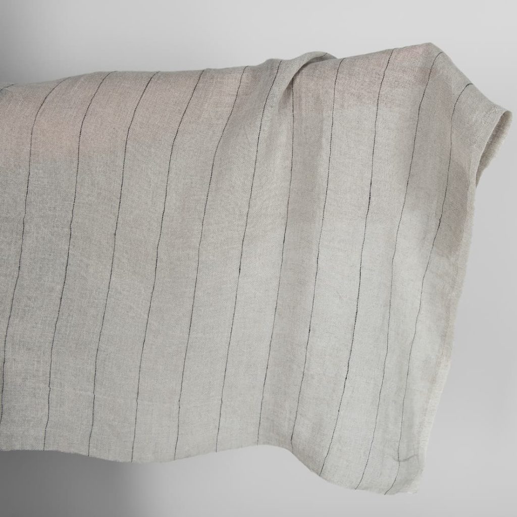 Natural transparent linen fabric with black stripes washed
