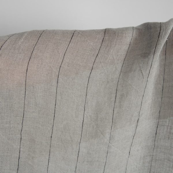 Natural transparent linen fabric with black stripes washed close up detail