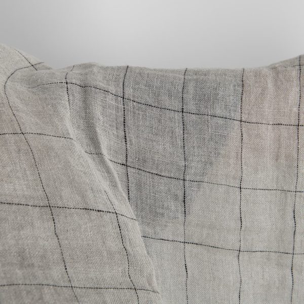Natural transparent checked linen fabric washed close up detail