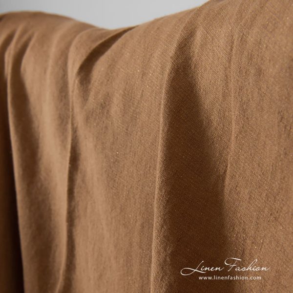 Light brown linen fabric with golden lurex, specially washed