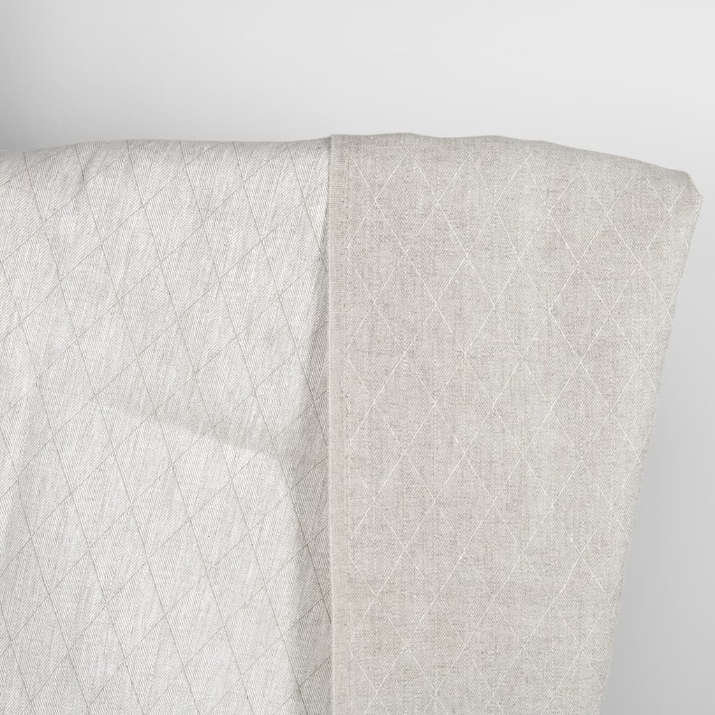 Beige double-sided linen fabric in a diamond pattern